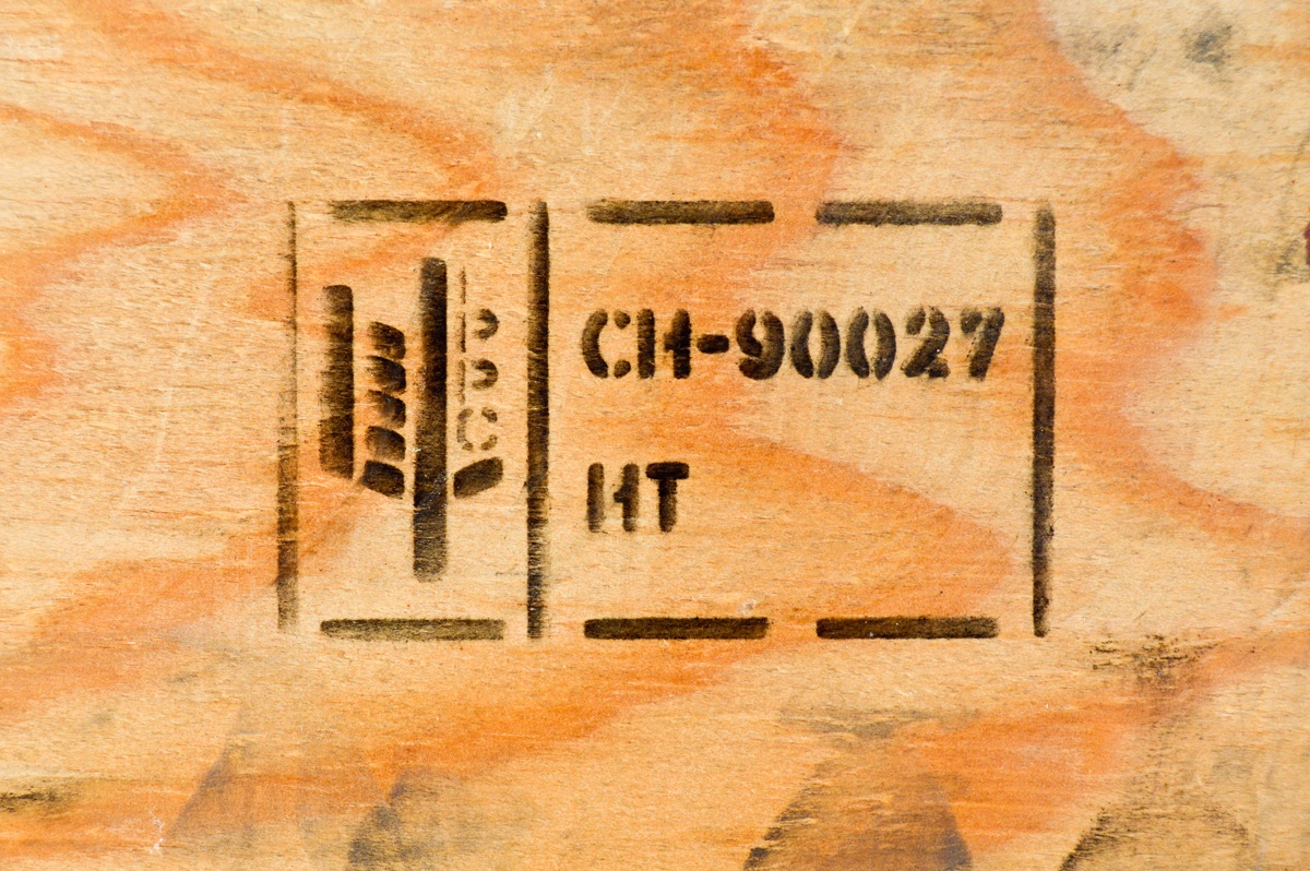 picture of a standard ISPM-15 marking on wood background