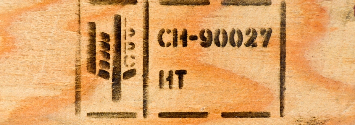 picture of a standard ISPM-15 marking on wood background